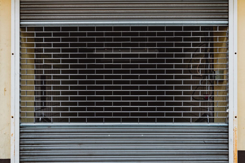 Perforated metal security shutter background